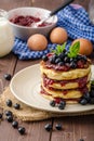 Glutten-free pancakes with jam and blueberries