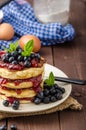 Glutten-free pancakes with jam and blueberries