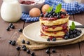 Glutten-free pancakes with jam and blueberries