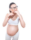 Glutton pregnant woman over white