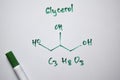 Glycerol C3,H8,O3 molecule written on the white board. Structural chemical formula. Education concept