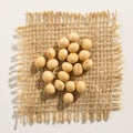 Soybean legume. Close up of grains over burlap.