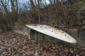 GlÃÂ¼cksburg, Germany, January 01, 2020: An old surfboard lies neglected on a beach