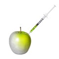 GMO food concept. Genetically modified green apple and syringe isolated on white. Genetic injection Royalty Free Stock Photo