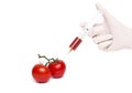 Gmo product concept: Tomato injection Royalty Free Stock Photo