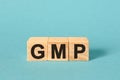 GMP Good Manufacturing Practice - inscription on cubes
