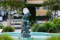 GMUNDEN, AUSTRIA, - AUGUST 03, 2018: Fountain and tatue the Gnome by artist Heinrich Natter in Gmunden, Austria. Royalty Free Stock Photo