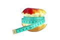 Gnawed apple and tape surveyor Royalty Free Stock Photo