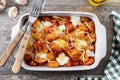 Gnocchi Alla Sorrentina with tomato sauce and oven-baked melted mozzarella cheese on wooden table. Copy space Royalty Free Stock Photo