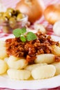 Gnocchi di patata with sauce bolognese Royalty Free Stock Photo