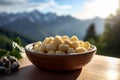 Gnocchi Dish with Dolomites Mountain Range Backdrop