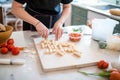 gnocchi making process with dough cutter