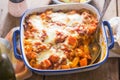 Gnocchi, pumpkin, chickpeas bale in tomato sauce with cheese Royalty Free Stock Photo
