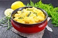 Gnocchi pumpkin with sage in bowl on dark board