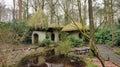 Gnome mushroom house in forest in themepark efteling