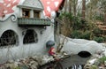 Gnome mushroom house in forest in themepark efteling