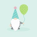 A party gnome holding a balloon