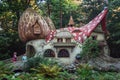 The gnome village with the mushroom houses in the fairytale fore