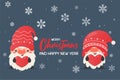 a gnome wearing a christmas hat Holding a red heart label Snowy winter at Christmas Royalty Free Stock Photo