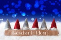 Gnomes, Blue Background, Bokeh, Geschenk Ideen Means Gift Ideas Royalty Free Stock Photo