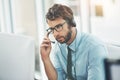 Go ahead sir, Im listening. a young man working in a call center. Royalty Free Stock Photo