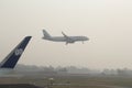 Go air Aircraft lands in heavy smog