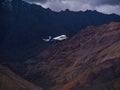 Go Air indian passenger plane fly up from Leh airport surrounded by Himalaya mountain range