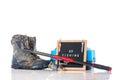 Go fishing concept. Box, rod with reel, fishing boots and black letterboard with words go fishing and fishing lures isolated on Royalty Free Stock Photo