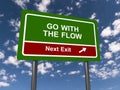 go with the flow next exit traffic sign on blue sky Royalty Free Stock Photo