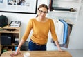 Go getter in action. Portrait of a young female designer at her desk.