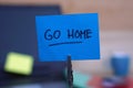 Go home written on a memo Royalty Free Stock Photo