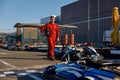 Go-kart driver walking to car before race at starting line Royalty Free Stock Photo