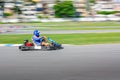 Go Kart Racer on track, Shot is panned Royalty Free Stock Photo