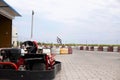 The go-kart stands on the go-kart track Royalty Free Stock Photo