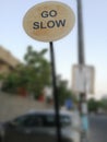 Go Slow traffic sign in Delhi Royalty Free Stock Photo