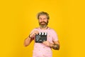 Go to cinema. man with movie clapper. bearded guy with film making clapperboard. movie time. Film director concept Royalty Free Stock Photo