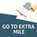 GO TO EXTRA MILE Announcement. Hand Holding Megaphone With Speech Bubble Royalty Free Stock Photo