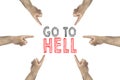 Go to hell concept. Hands around showing to the inscription: go to hell