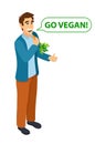Go vegan. Isometric young character eats a carrot.