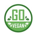 Go Vegan stamp symbol- Vegetarian food safety logo with green leaves