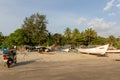 Goa, India - December 20, 2018: Fishermen prepare tackle and boats on Morjim Beach Royalty Free Stock Photo