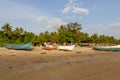 Goa, India - December 20, 2018: Fishermen prepare tackle and boats on Morjim Beach Royalty Free Stock Photo