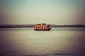 Goa, India - December 20, 2018: Indian style pleasure boat on the Chapora River
