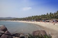 GOA, INDIA - JANUARY 31, 2014:Vacationers, sellers, cafe on the tropical beach Palolem Royalty Free Stock Photo