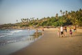 GOA, INDIA - MARCH 4: Family are walking at Little Vagator Beach