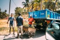 Goa, India. Workers Carry Out Repair On Road