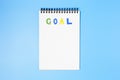 Goal,action text on notepad .Business motivation,inspiration concepts ideas Royalty Free Stock Photo