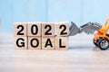 2022 goal cube blocks with miniature truck or construction vehicle. New Start, Vision, Resolution, goal, industrial, Warehouse and