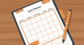 Goal planner with a grid layout on a wooden desk. Sections include \
