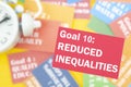 The Goal 10 : Reduced Inequalities. The SDGs 17 development goals environment. Environment Development concepts